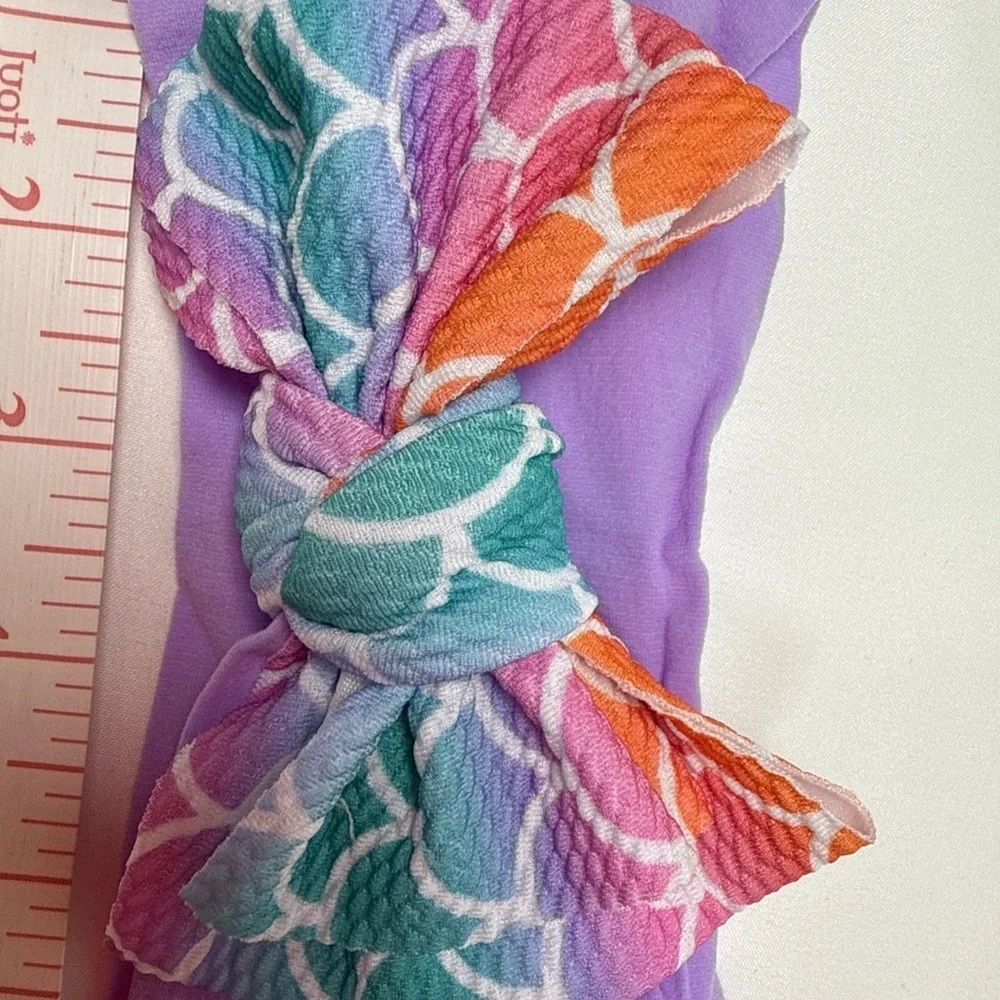 Vibrant Purple and Orange Hair Bow Accessory